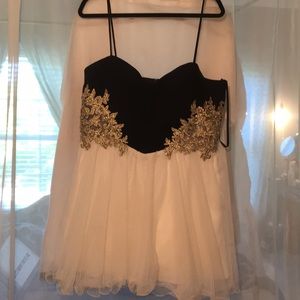 White, gold, and navy blue homecoming dress